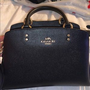 Coach purse never been used.